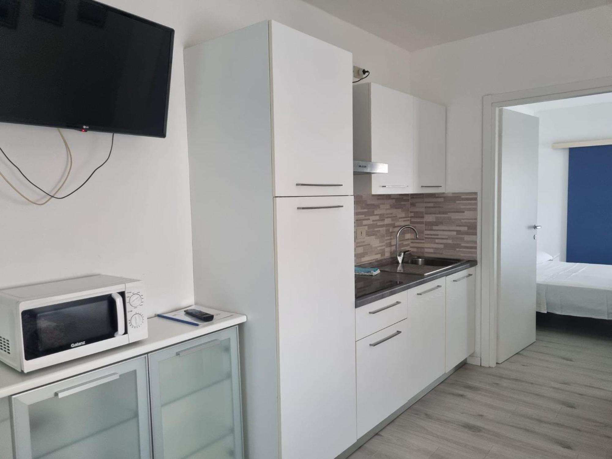 Appart-Hotel Holiday Lignano Sabbiadoro Szoba fotó