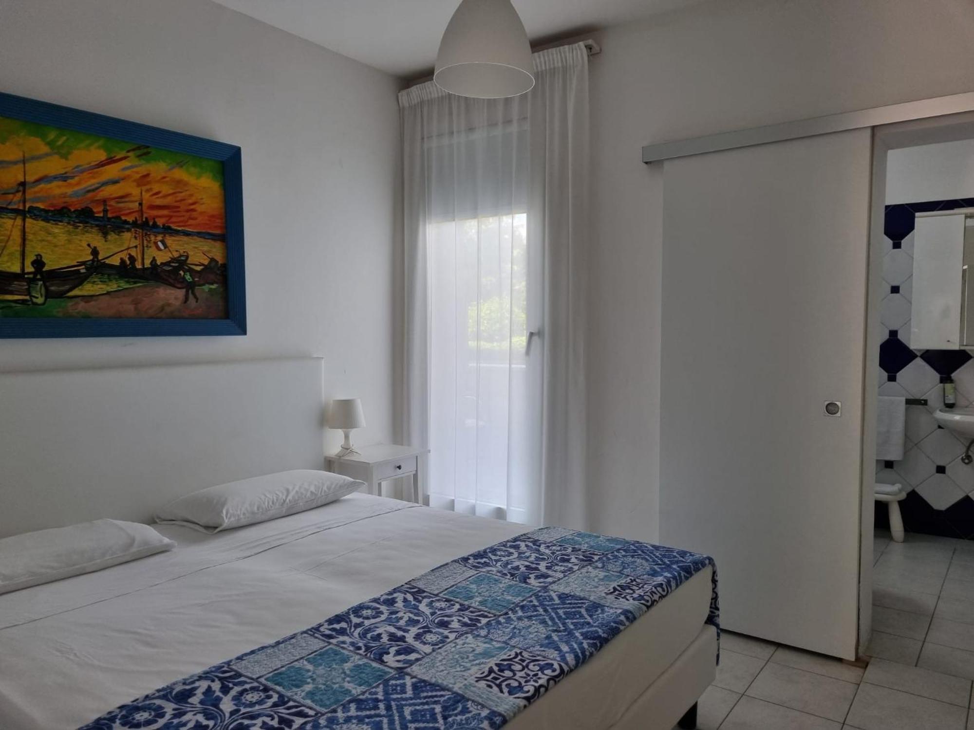 Appart-Hotel Holiday Lignano Sabbiadoro Szoba fotó